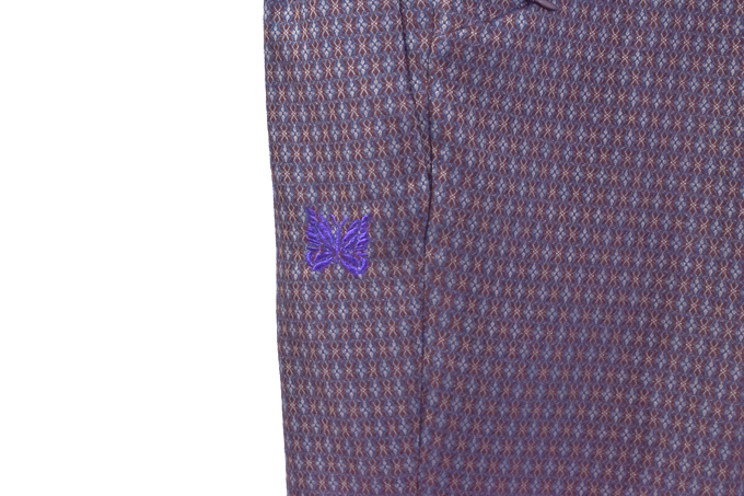 TUCKED SIDE TAB TROUSER - PE/R/PU GEOMETRIC JQ. / DK Brown | Needles